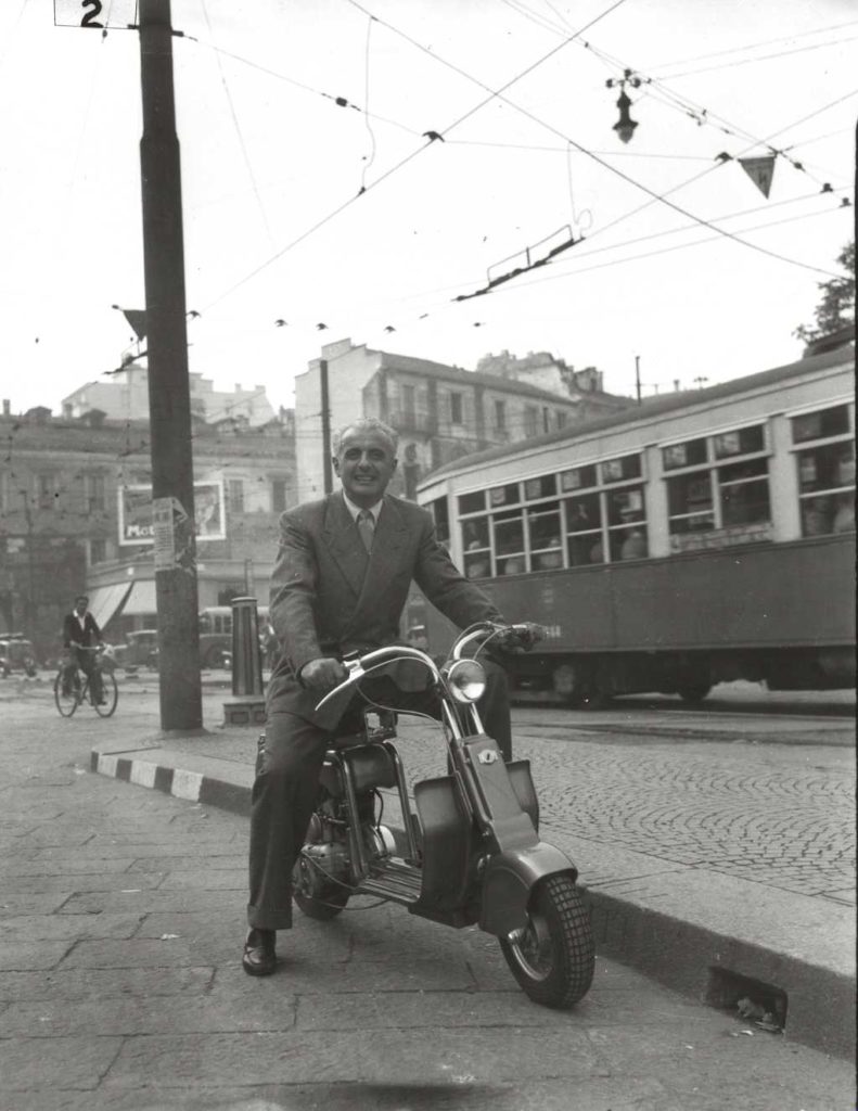 1949 Gigi Villoresi with a Lambretta 125B in Milan