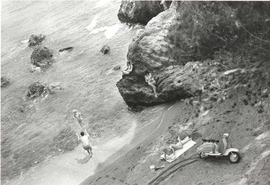 1960 four persons on the beach with Lambretta scooter