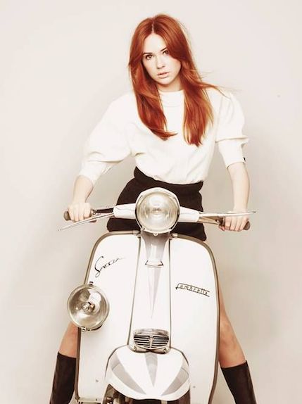 Karen Gillan on white Lambretta scooter